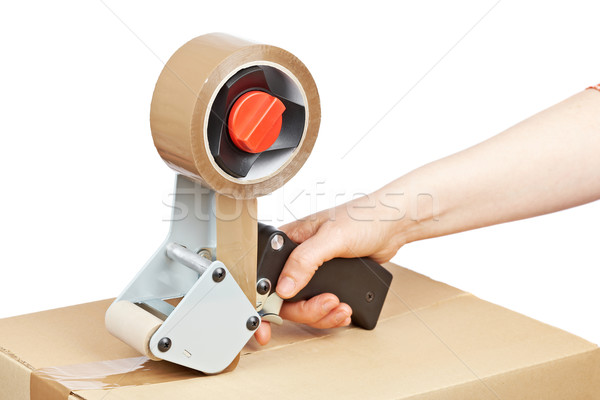 Packaging tape dispenser and shipping box Stock photo © broker