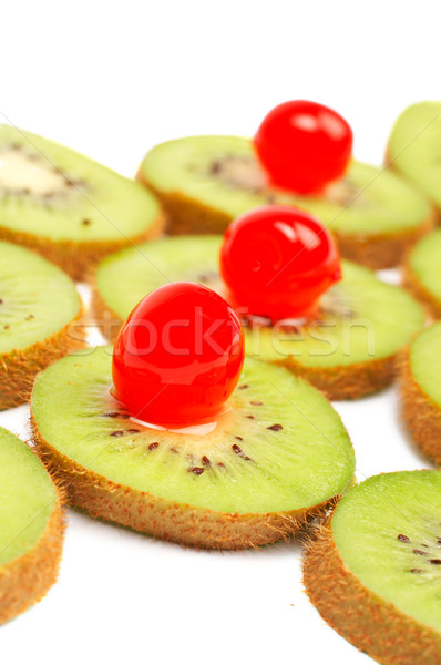 Kiwis slices with cherries Stock photo © broker