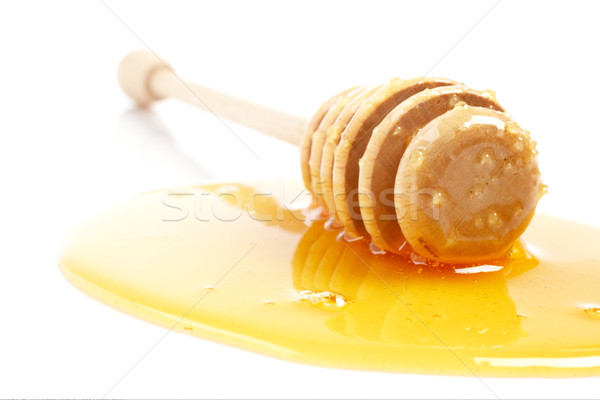 Honey and wooden drizzler Stock photo © broker