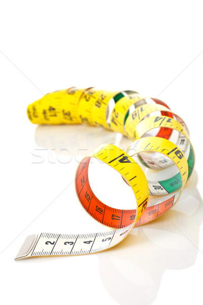 Curled measuring tape Stock photo © broker