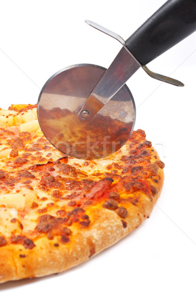 Italian pizza and cutter Stock photo © broker