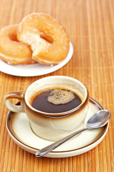 Delicious coffee and two donuts Stock photo © broker