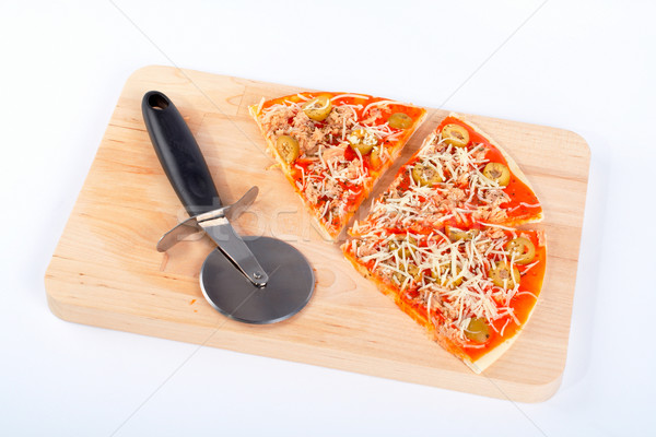 Slices of Italian pizza and cutter Stock photo © broker