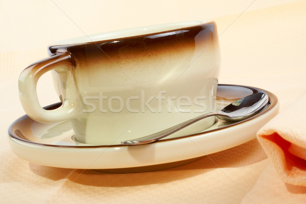 Stock photo: Close-up of a cup of coffee with the spoon