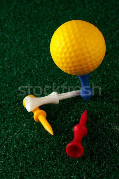 Yellow golfball and tees Stock photo © broker