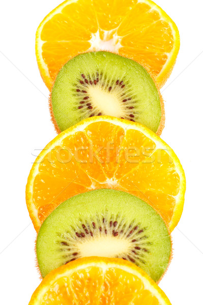 Oranges and kiwis slices Stock photo © broker