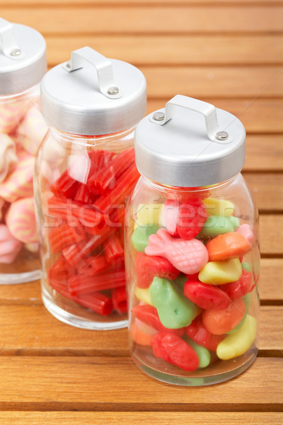Glass jars of candies Stock photo © broker