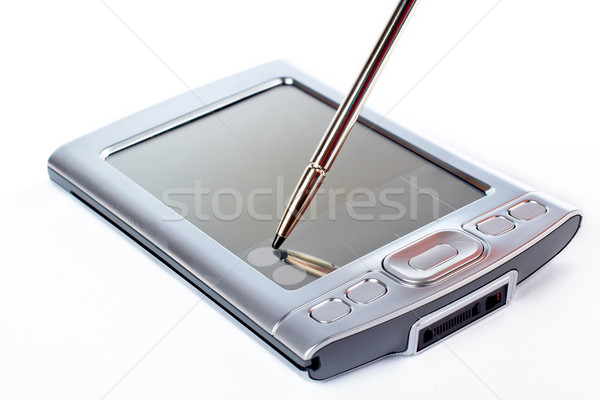 Stylus on screen of PDA Stock photo © broker