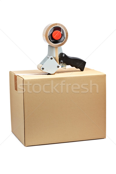 Packaging tape dispenser and shipping box Stock photo © broker