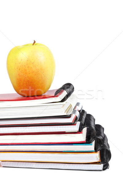 Apple and some notebooks Stock photo © broker