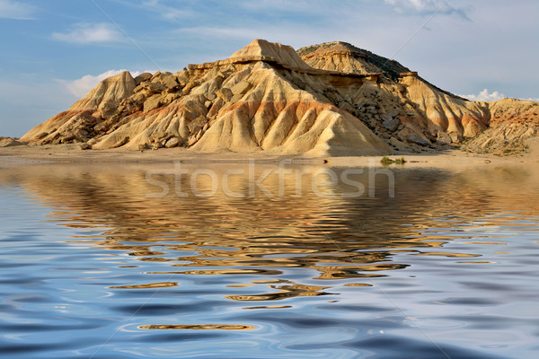 Hill reflected in the water Stock photo © broker