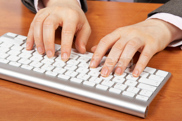Işkadını yazarak bilgisayar klavye sığ el dizüstü bilgisayar Stok fotoğraf © broker