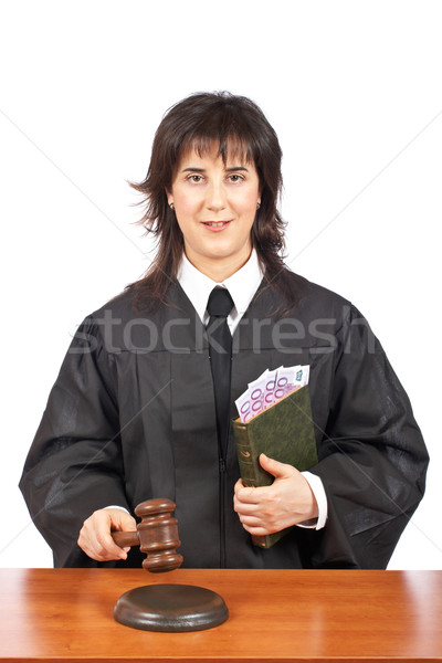 Stock photo: Justice accepting a bribe