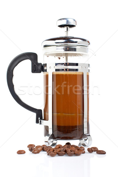 A coffee pot with beans Stock photo © broker