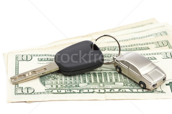 Slusszkulcs pénz dollár bankjegyek fehér sekély autó Stock fotó © broker