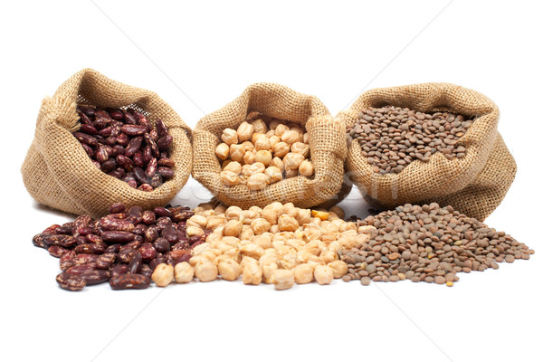 Lentils, chickpeas and red beans spilling out Stock photo © broker