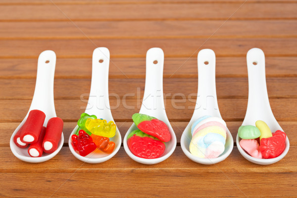 Candies in the spoons Stock photo © broker