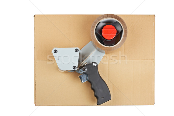 Packaging tape dispenser and shipping box Stock photo © broker