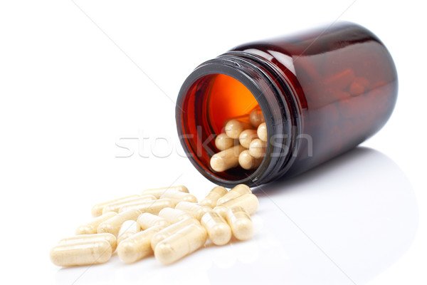 Capsules out from the flask Stock photo © broker