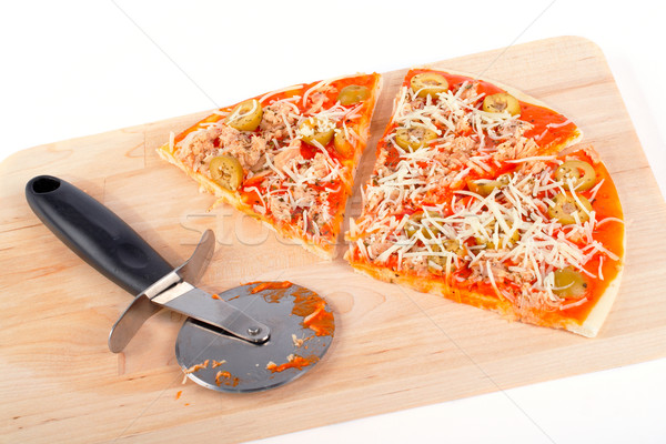 Slices of Italian pizza and cutter Stock photo © broker