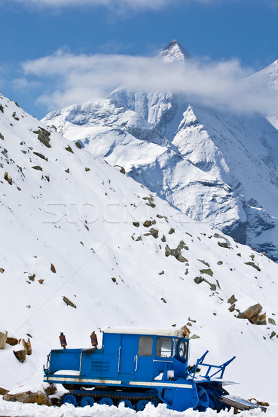 Snowplow in alpine road Stock photo © broker