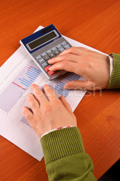Business woman calculating Stock photo © broker