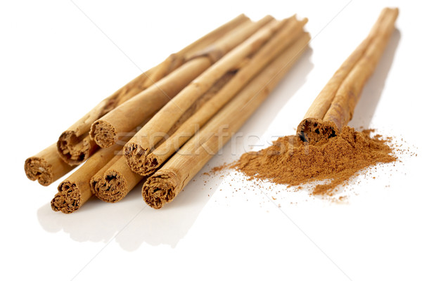 Stock photo: Sticks and powder of cinnamon
