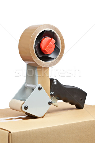 Packaging tape dispenser and shipping box Stock photo © broker