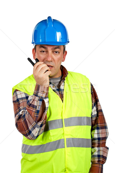 építőmunkás beszél adóvevő zöld mentőmellény fehér Stock fotó © broker