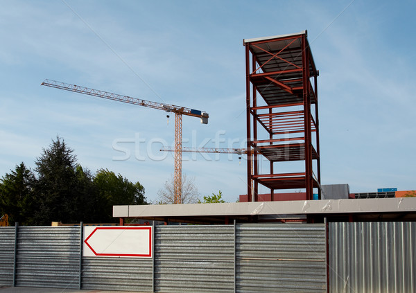 Stock photo: Steel Structure and Construction crane set against a blue sky