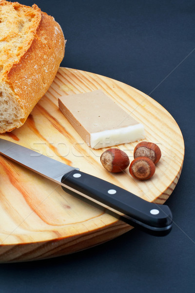 Stock photo: Pate, bread, hazelnuts and knife on wood plate