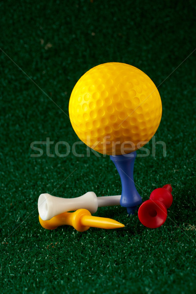 Yellow golfball and tees Stock photo © broker