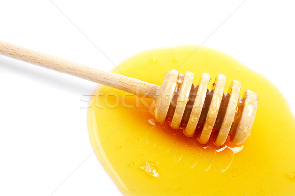 Honey and wooden drizzler Stock photo © broker