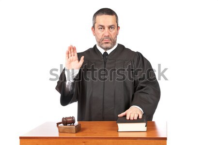 Serious male judge taking oath Stock photo © broker