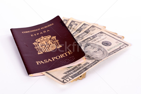 Money in the Spanish passport Stock photo © broker