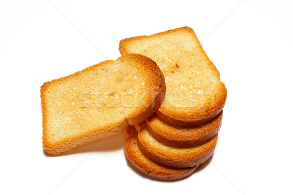 Some slices of toasted bread isolated on white background Stock photo © broker