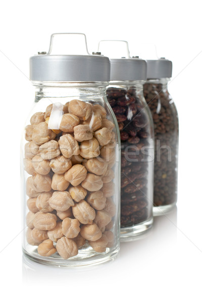 Glass jars of chickpeas, red beans and lentils Stock photo © broker