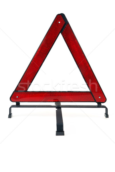 Warning triangle over white background Stock photo © brozova