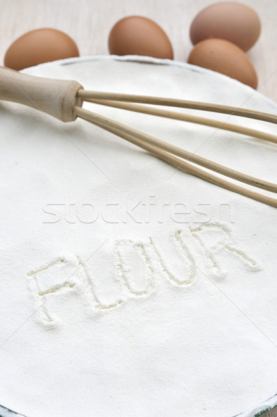 Word 'flour' handwritten in flour Stock photo © brozova