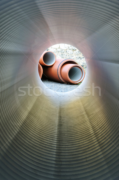 Inside of plastic tube. View on pipe stack. Stock photo © brozova