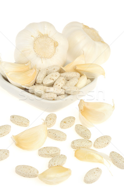Fokhagyma szárított növénygyűjtemény kiegészítő tabletták izolált alternatív gyógymód Stock fotó © brozova