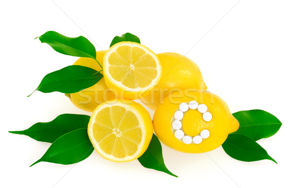 Cytryny witamina c pigułki biały zdrowia tle Zdjęcia stock © brozova