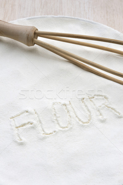 Word 'flour' handwritten in flour Stock photo © brozova