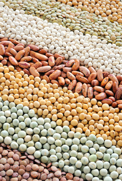 Mixture of dried lentils, peas, soybeans, beans  - background Stock photo © brozova