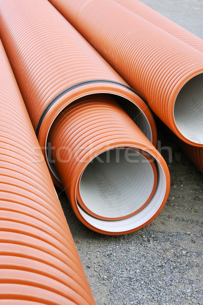 Stock photo: Plastic drainage pipes stacked - sewage conduitPlumbing tubes close-upPlumbing tubes close-up