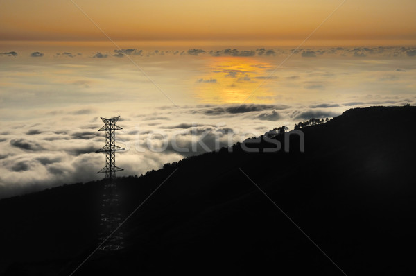 Electricity pylon over valley at sunset, Lomba das Torres,  Madeira island, Portugal Stock photo © brozova