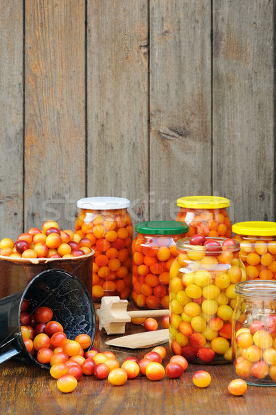 Preserving Mirabelle plums - jars of homemade fruit preserves – Mirabelle prune Stock photo © brozova