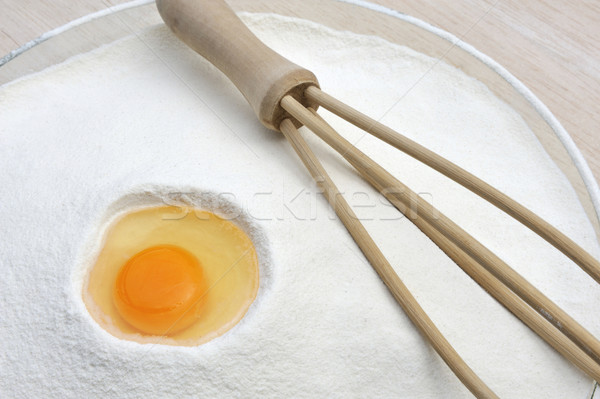 Flour and eggs ready for mixing Stock photo © brozova