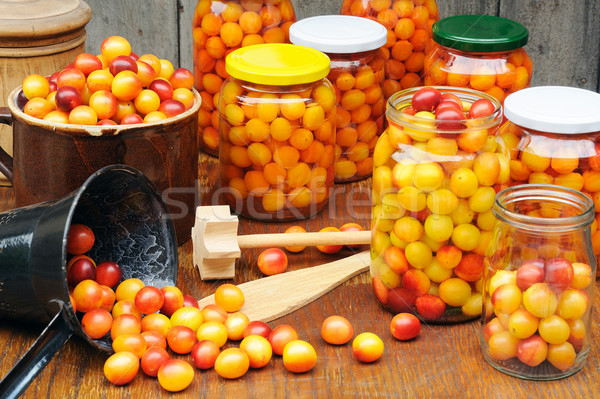 Preserving Mirabelle plums - jars of homemade fruit preserves – Mirabelle prune Stock photo © brozova