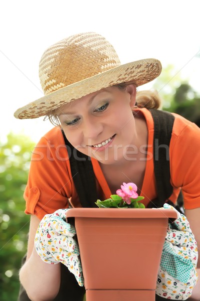 Stock photo: Young woman - gardening